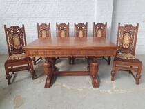 Table + 6 chairs Tudor style Belgium Oak 1920